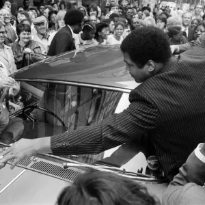 Muhammad Ali is mobbed by fans and supporters in the streets of Birmingham Muhammad Ali is mobbed by fans and supporters in the streets of Birmingham