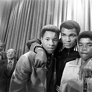 Muhammad Ali at a press conference with Phillip "Chip"McAllister, left