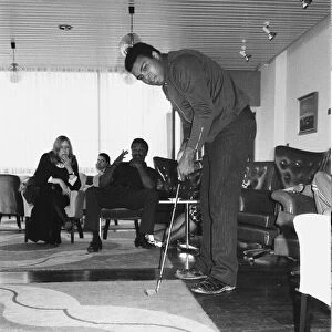 Muhammad Ali seen here playing a round of tea cup golf at his hotel near Dublin