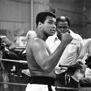 Muhammad Ali takes a break from training ahead of this third fight with Ken Norton with