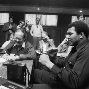 Muhammad Ali talking to repoters at the Concord Hotel in Catskill Mountains Muhammad Ali talking to repoters at the Concord Hotel in Catskill Mountains