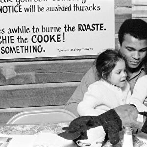 Muhammad Ali with twin daughters Jamillah and Rasheda in Deer Lake Pennsylvania