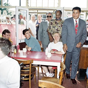 Muhammad Ali visits a cafeteria in London England. 26th May 1992