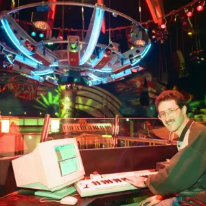 Murry Wetton at work on the computer which operates the lighting rigg
