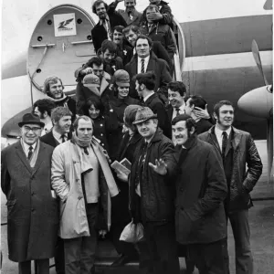 Murryfield here we come... The Wales team and officials board the aircraft at Rhoose