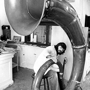 Museum technician Richard Miller was to knock out the dents in this giant auyetephone