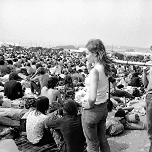 Music fan with telescope at The Isle of Wight Festival. 30th August 1970