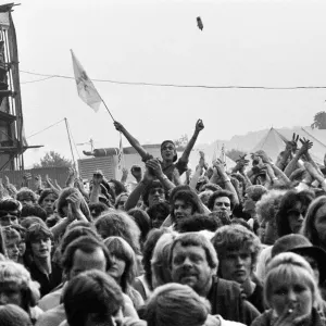 Music fans watching bands performing on Saturday night at the Reading Festival Music fans watching bands performing on Saturday night at the Reading Festival