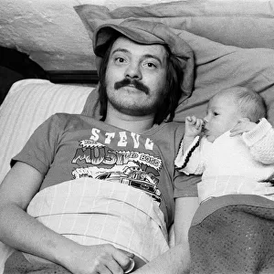 Musician Steve Marriott with his son Toby at their Essex home. 14th April 1976