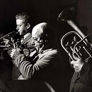 musicians, brass instruments - trumpet - tuba - brass band circa 1950