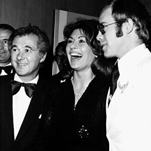 Nanette Newman with husband Bryan Forbes and Elton John at the "Gold"