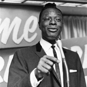 Nat King Cole, American singer, and pianist performing in London Nat King Cole, American singer, and pianist performing in London