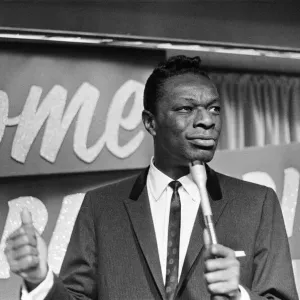 Nat King Cole, American singer, and pianist performing in London Nat King Cole, American singer, and pianist performing in London