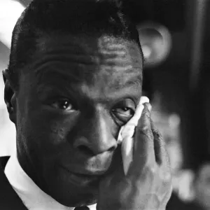 Nat King Cole, American singer, and pianist performing in London Nat King Cole, American singer, and pianist performing in London