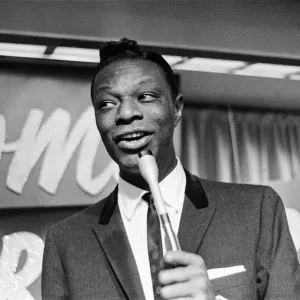 Nat King Cole, American singer, and pianist performing in London Nat King Cole, American singer, and pianist performing in London