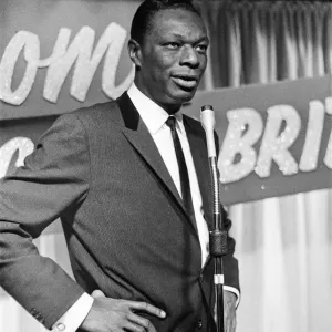 Nat King Cole, American singer, and pianist performing in London Nat King Cole, American singer, and pianist performing in London