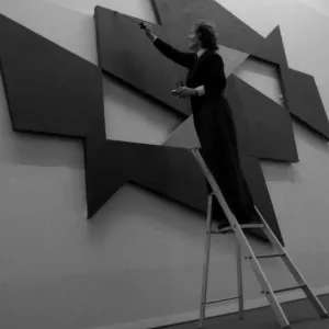Natalie Dower puts the finishing touches to her exhibition piece at the Mead Gallery