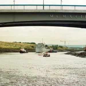 Former Navy Minehunter HMS Kellington being towed underneath the Princess of Wales Bridge Former Navy Minehunter HMS Kellington being towed underneath the Princess of Wales Bridge