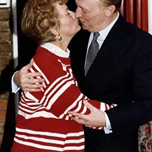 Neil Kinnock MP and wife Glenys Kinnock MEP kiss on the occasion of their 25th wedding