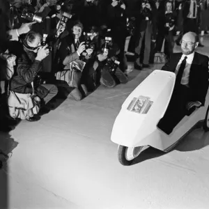 The New Electric Vehicle Sir Clive Sinclair in his new electric vehicle