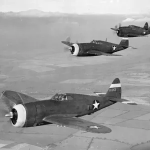 New US Fighter. P 47s (Thunderbolt) planes flying in formation