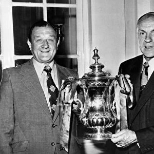 New Liverpool manager Bob Paisley (left) and retiring manager Bill Shankly pose with