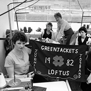 The new Loftus Greenjackets banner is held up by Julie Scaife (left) and Burton