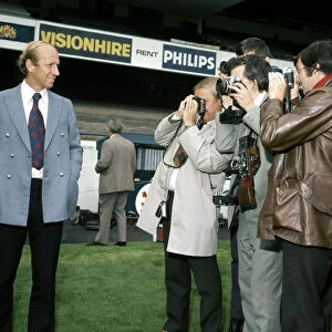 New Preston North End manager Bobby Charlton meets press cameramen at the club