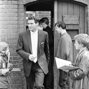 New signing (from Wolves) Eddie Stuart leaving main entrance, 15th August 1962