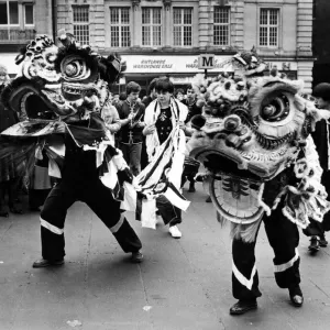New Year Chinese style. A festive Dragon dance underway at Greys Monument, Newcastle