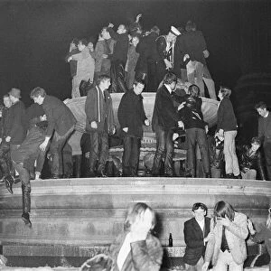 New Years Day 1967. Young people celebrate in the fountains at Trafalgar Square, London