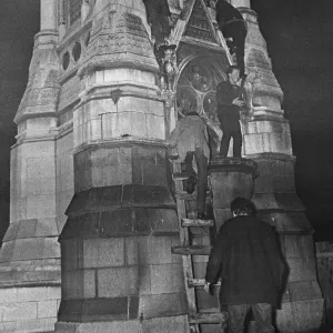 New Years reveller seen here climbing the Chamberlain Memorial in Chamberlain Square