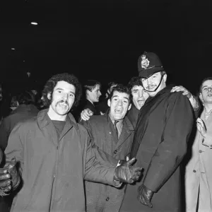 New Years revellers seen here celebrating with police in Ratcliffe Place