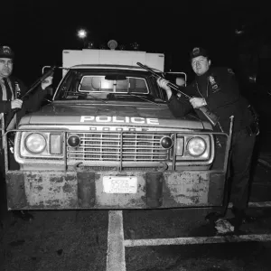 Two New York Policemen in front of their truck. 13th February 1981 Two New York Policemen in front of their truck. 13th February 1981