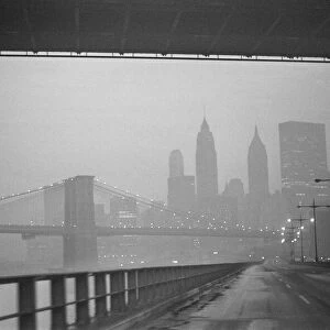 New York skyline and Brooklyn Bridge seen from the FDR Drive 25th January 1970
