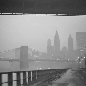New York skyline and Brooklyn Bridge seen from the FDR Drive 25th January 1970 New York skyline and Brooklyn Bridge seen from the FDR Drive 25th January 1970