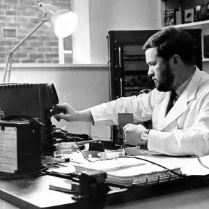 Newcastle General Hospital. An electronic technician tests neurophysiology apparatus in Newcastle General Hospital. An electronic technician tests neurophysiology apparatus in