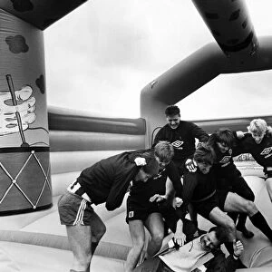 Newcastle United 1986, Pre Season. Players take time out on a inflatable bouncing castle