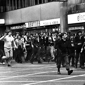 Newcastle United Supporters march along Pilgrim Street in Newcastle 25 / 03 / 80