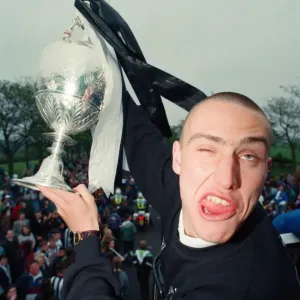 Newcastle United win the League Division 1. Players on the open top bus with the trophy