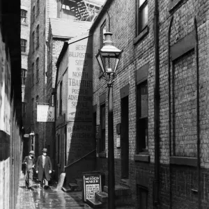 Newcastles early morning workers walk through the lighted Forth Lane in Newcastles early morning workers walk through the lighted Forth Lane in