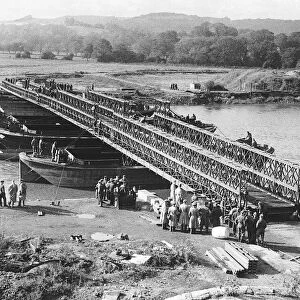 Newly invented Bailey Bridge built in Britain and the USA is demonstrated across a