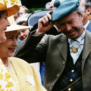 Nicholas Fairbairn MP conservative politician at garden party raising hat to the Queen Nicholas Fairbairn MP conservative politician at garden party raising hat to the Queen