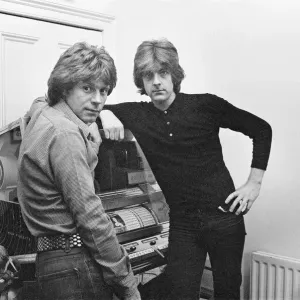 Nick Lowe dark shirt) and Dave Edmunds (in lighter shirt) pictured together in 1979