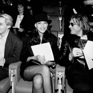 Nick Rhodes, Julianne Rhodes and Simon Le Bon watch Yasmin Le Bon during a fashion show print Nick Rhodes, Julianne Rhodes and Simon Le Bon watch Yasmin Le Bon during a fashion show print