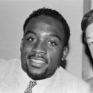 Nigel Benn with manager Frank Warren ahead of his next fight against American Tim