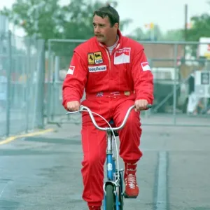 Formula 1 Print: Nigel Mansell on a Bike at Silverstone Formula 1 Print: Nigel Mansell on a Bike at Silverstone
