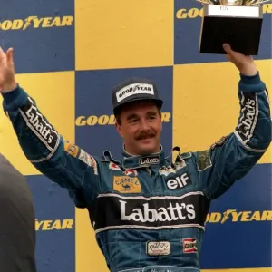 Nigel Mansell celebrates at the Belgium Grand Prix - August 1992