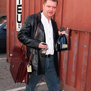 Nigel Martin Smith, manager of pop group Take That, pictured leaving news press