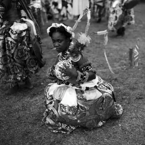 A Nigerian dancer from the Efik tribe stops at the end of a traditional dance for A Nigerian dancer from the Efik tribe stops at the end of a traditional dance for